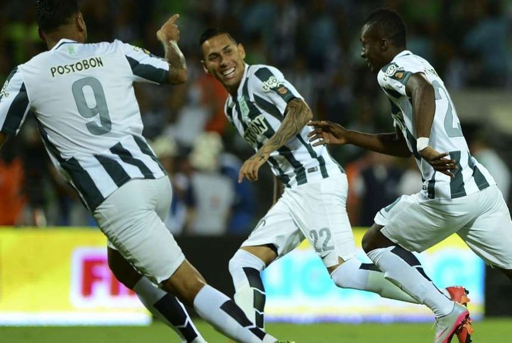 Jefferson Duque, Gilberto García y Marlos Moreno celebran un gol con el Atlético Nacional. Archivo/EFE
