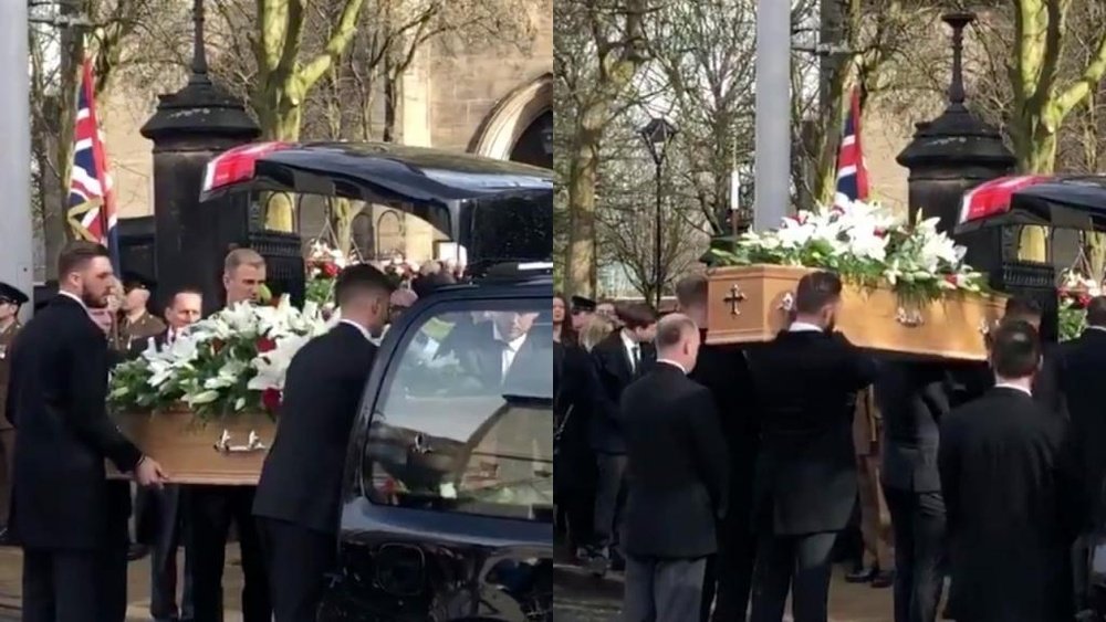 The coffin is carried into the Stoke-on Trent church.
