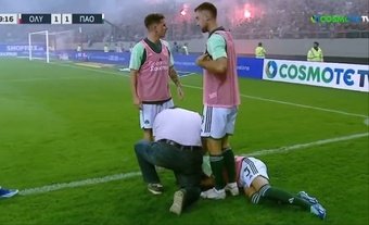 The Greek press reports that Panathinaikos' Juankar suffers partial hearing loss as a result of the firecracker that exploded next to him when he was warming up on the touchline during the 'Classico' in Greece. The match, between Olympiacos and Panathinaikos, was suspended.