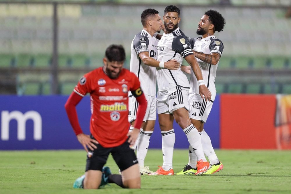 Jogadores do Atlético-MG celebram um gol contra o Caracas. EFE/ Rayner Peña R