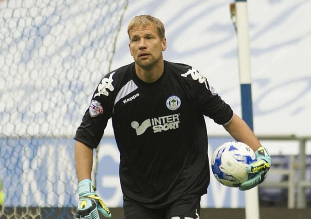 Jussi Jääskeläinen ha renovado su contrato un año más con el Wigan Athletic. AFP