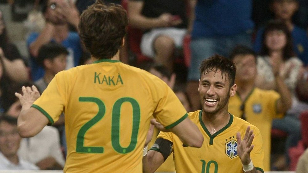 Kaka et Neymar lors d'un match avec le Brésil. AFP
