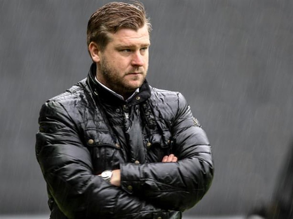 Karl Robinson has been in charge at MK Dons since 2010. MKDonsFC