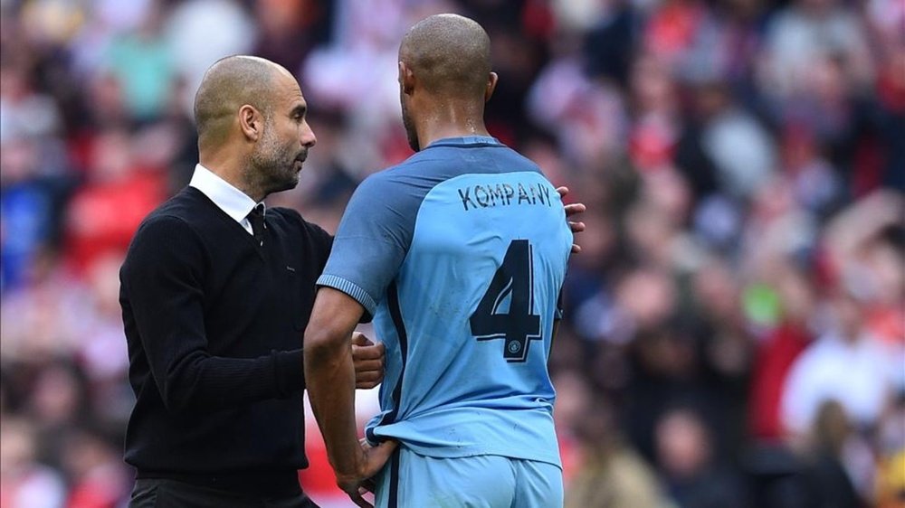 Kompany has heaped praise on Guardiola. AFP