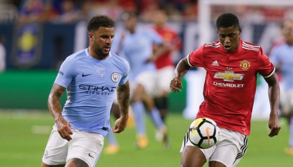 The 'Rossoneri' are interested in landing Walker and Rashford. AFP