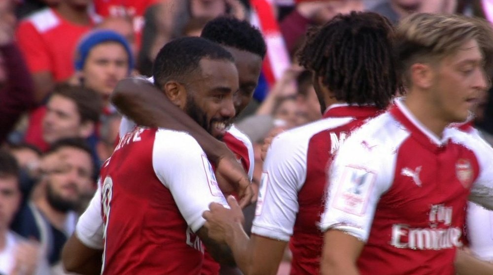 Lacazette celebrates his goal against Sevilla. Twitter