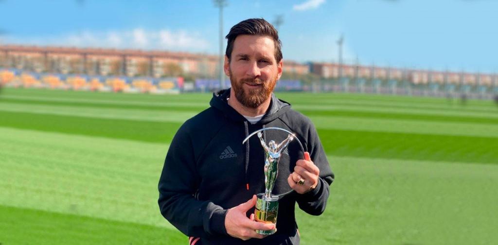 Messi proudly poses with Laureus award