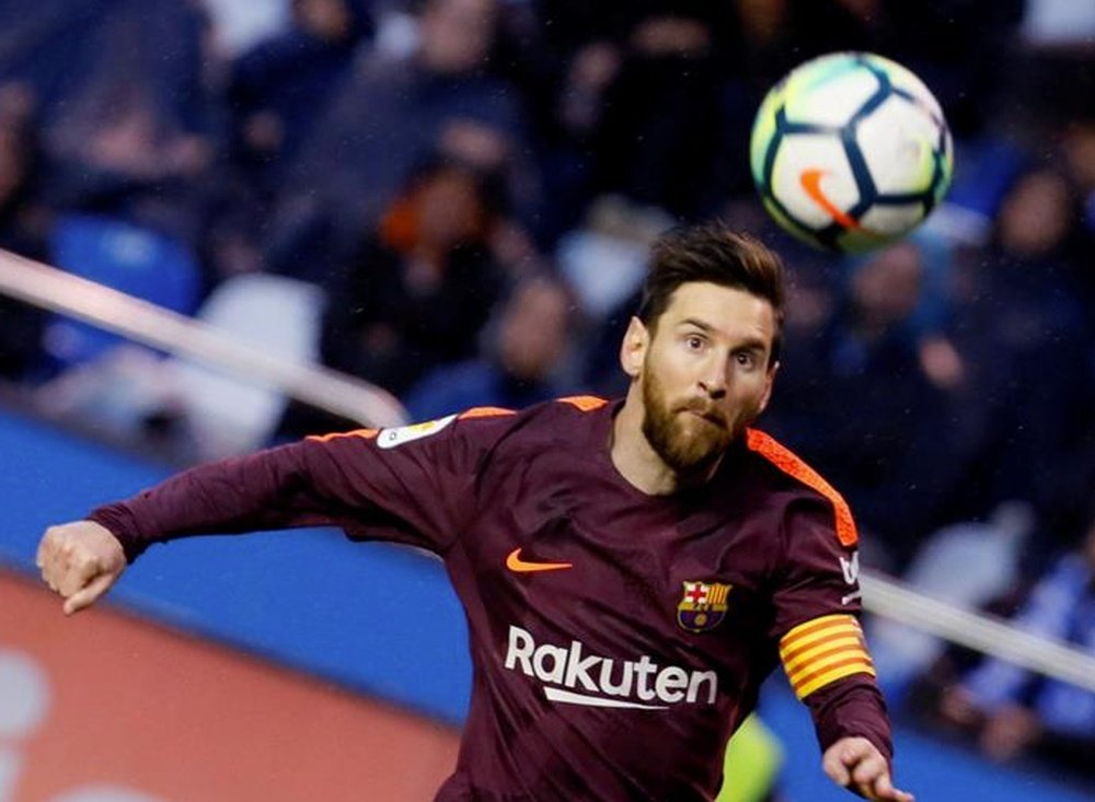 Messi hizo un 'hat trick' para llevar al Barça al título. EFE