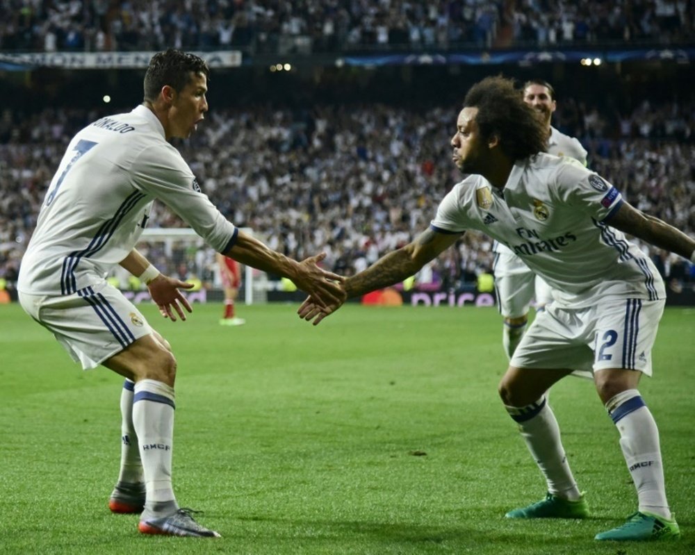 Les anciens coéquipiers du Real Madrid, Cristiano Ronaldo et Marcelo. AFP