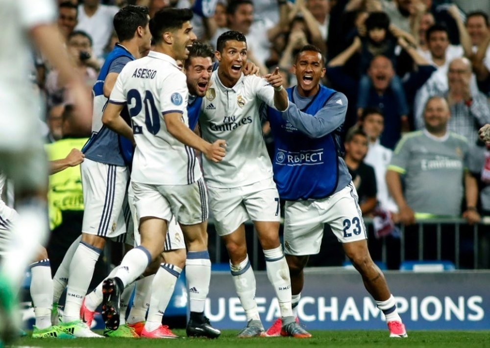 Les joueurs du Real Madrid célèbrent leur qualification en demi-finales de la C1. AFP