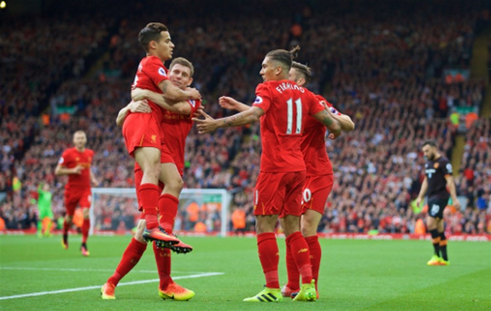 Liverpool celebrate scoring against Hull City. LiverpoolFC