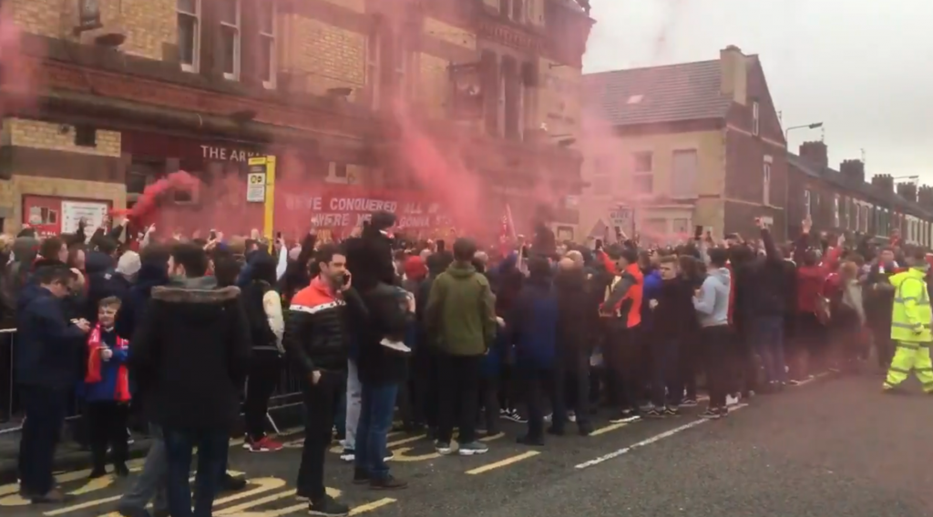 Liverpool fans arrived three hours early to welcome City to Anfield with flares