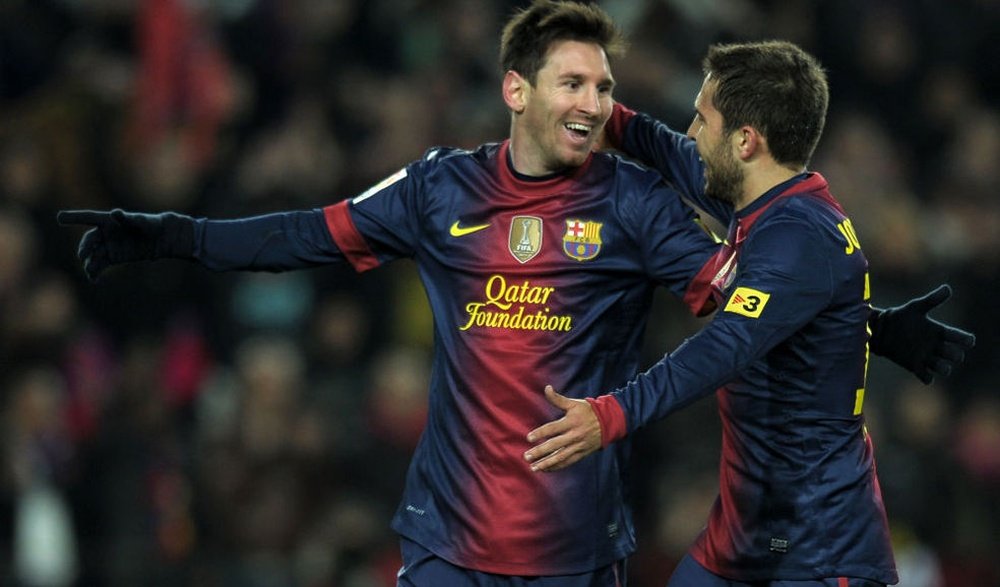 Les joueurs du FC Barcelone, Jordi Alba et Leo Messi, pendant un match. AFP