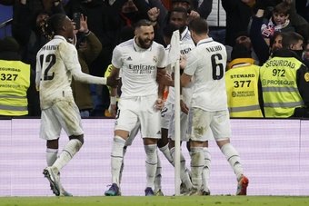 Madrid players celebrate combeack win. EFE