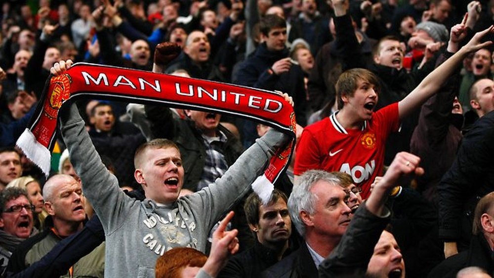 Manchester United fans supporting their club. Twitter