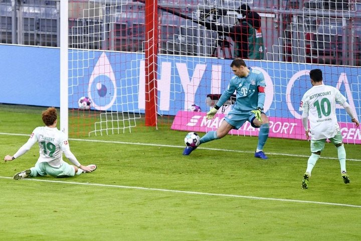 Neuer festeja su partido 400 salvando un punto para el Bayern