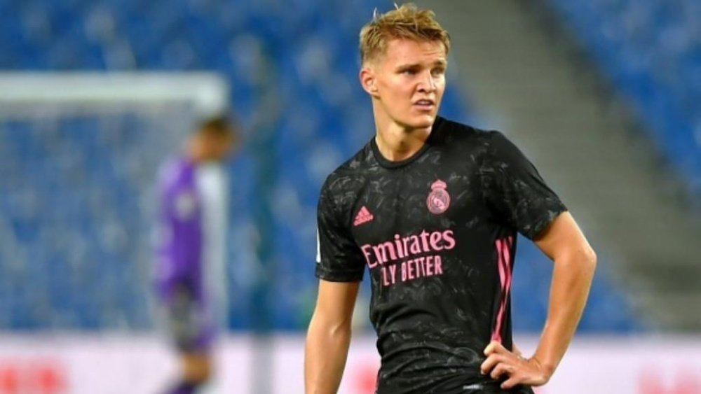 Odegaard solves Madrid's numbers problem. AFP