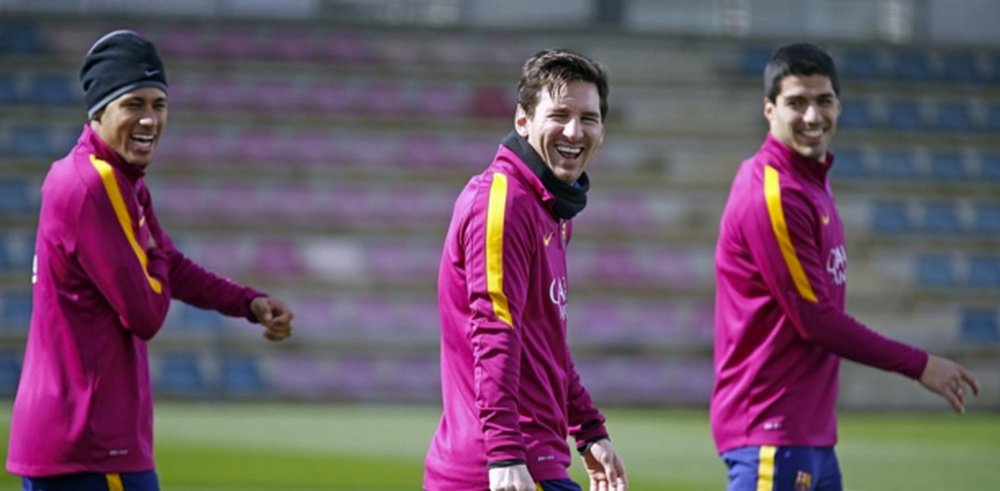 Messi, Neymar and Luis Suarez laughing during Barcelona training session. Instagram
