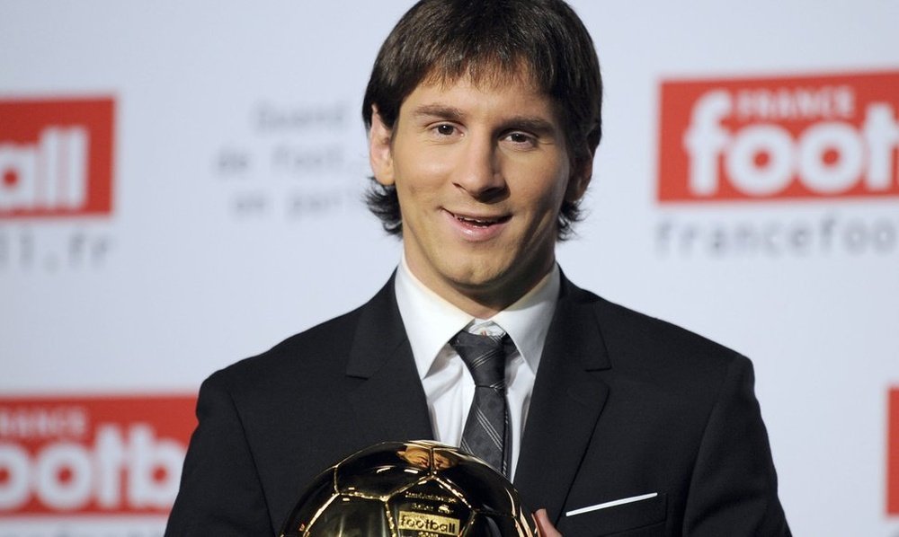 Messi poses with the Ballon d'Or in 2009. AFP