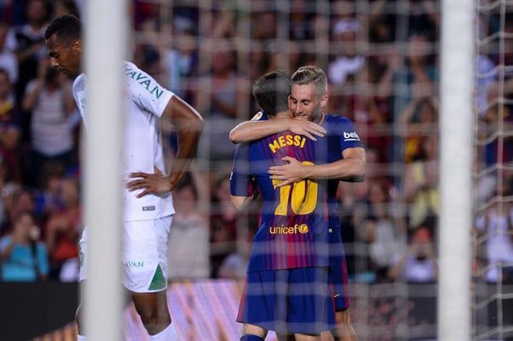 Deulofeu et Messi lors d'un match amical. AFP