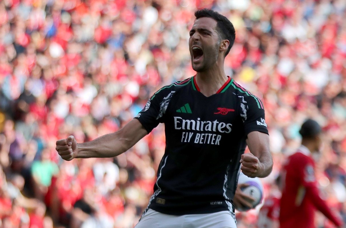 Ten-man Arsenal fight back to rescue valuable draw at Liverpool