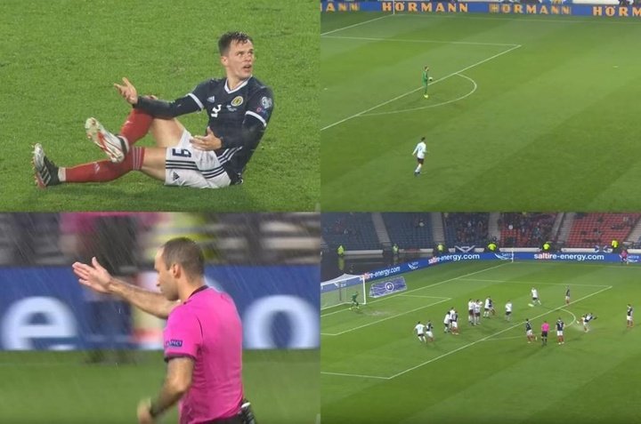 Ground swallow me up! San Marino goalkeeper gifts Scotland a foul that ends in a goal