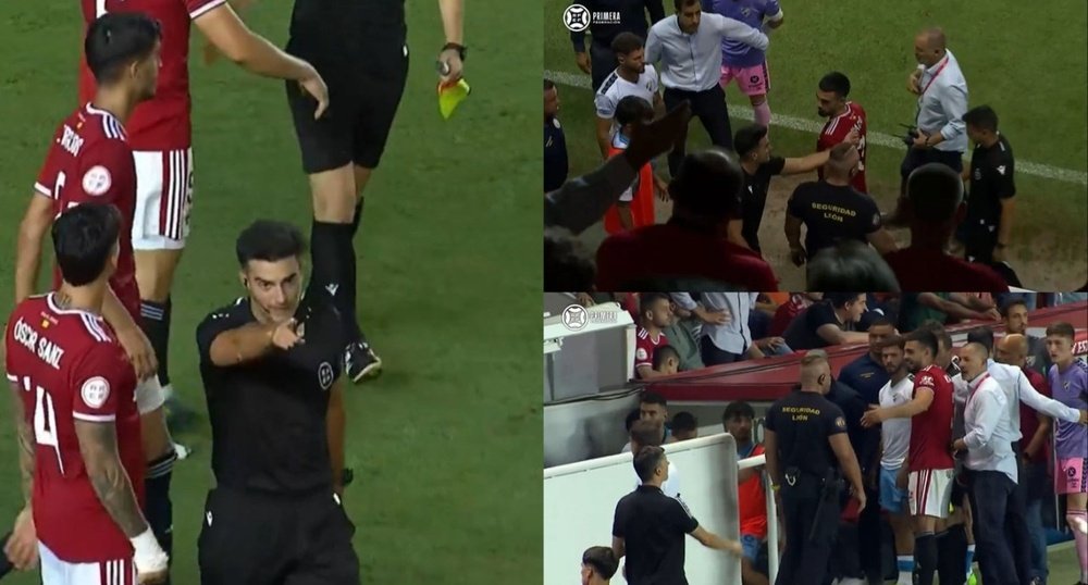 El árbitro paró el partido temporalmente por el lanzamiento de balones. Captura/FEFTV