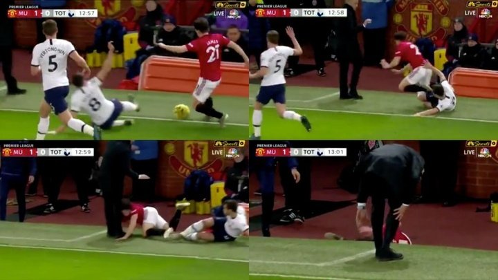 Daniel James takes a tumble after Winks foul... and he goes right into Mourinho's leg!