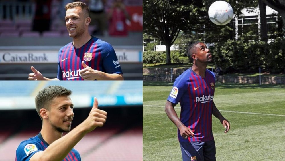 Arthur, Lenglet et Malcom ont rejoint le Barça cet été. AFP/FCBarcelona