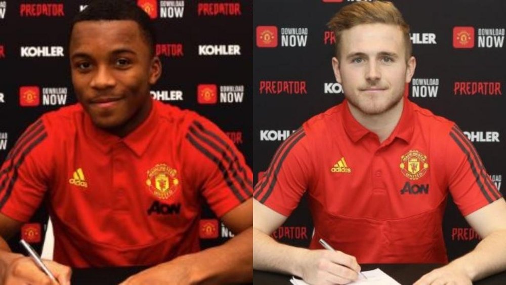 Manchester United prolonge deux espoirs du club. AFP