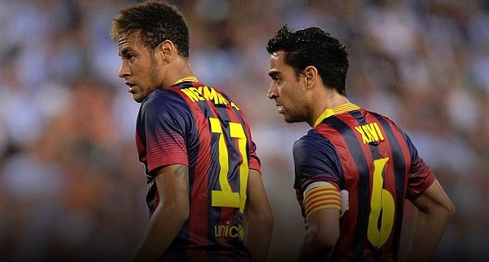 Neymar e Xavi atuaram juntos pelo Barcelona. EFE/Arquivo