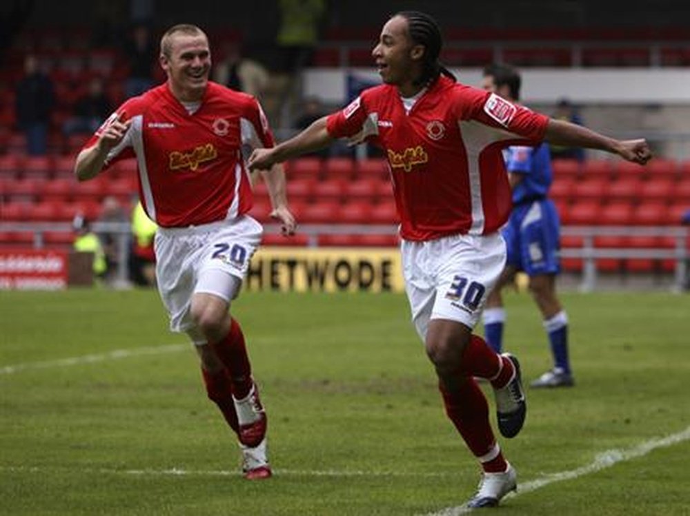 Nicky Maynard (R) scored MK Dons goal in their 4-1 defeat to Brentford. MKDonsFC