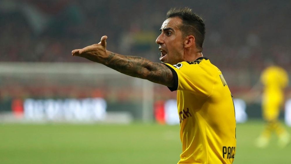 Alcacer wants to come back to Spain. AFP