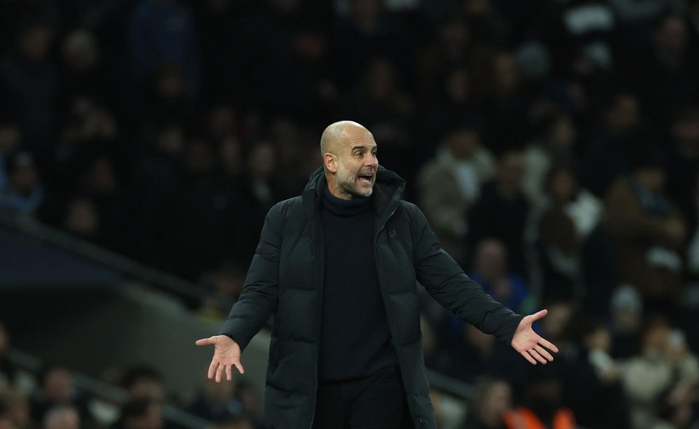 Gaurdiola would leave City if they're sanctioned. AFP
