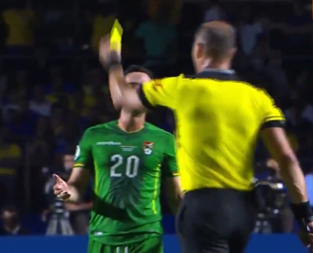 Pitana was allowed to give Saucedo a yellow card after the VAR review. Captura/DAZN