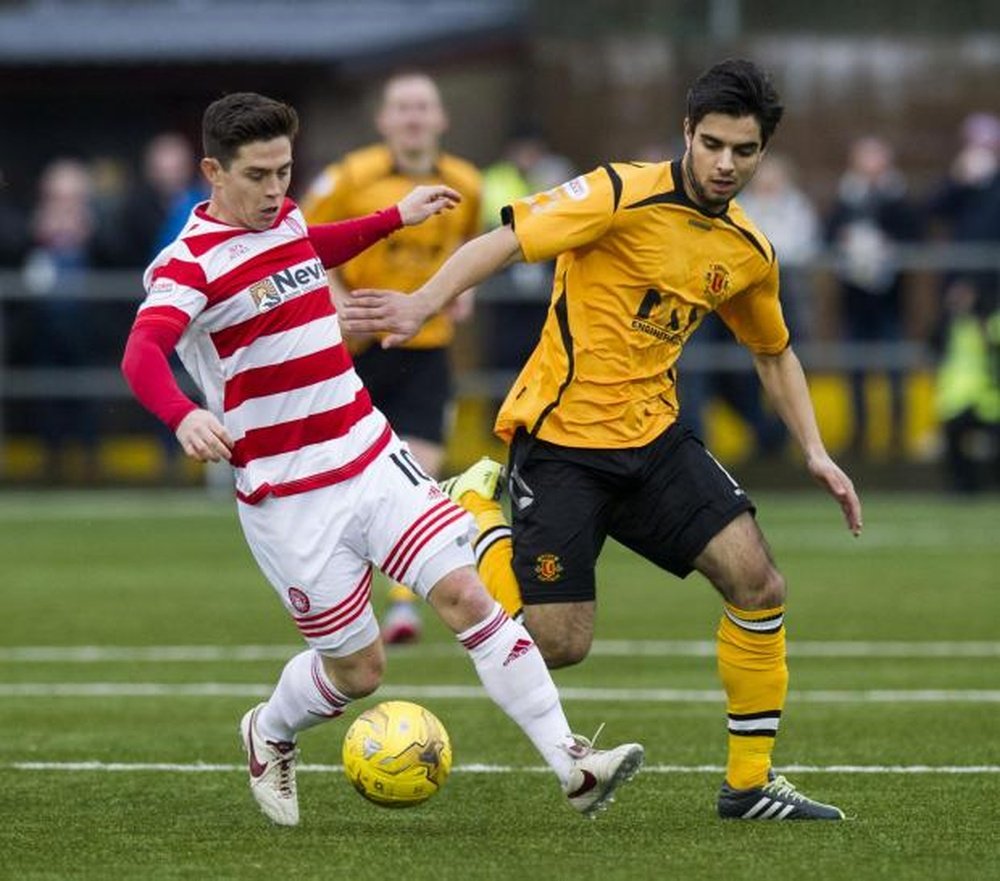 Rabin Omar (R) footballer for Scottish underdogs, Annan Athletic. Twitter