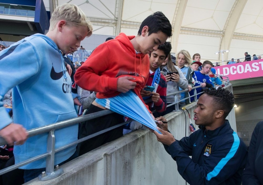 Raheem Sterling signs autographs before Manchester City friendly against Melbourne City at Cbus Super Stadium on July 18, 2015