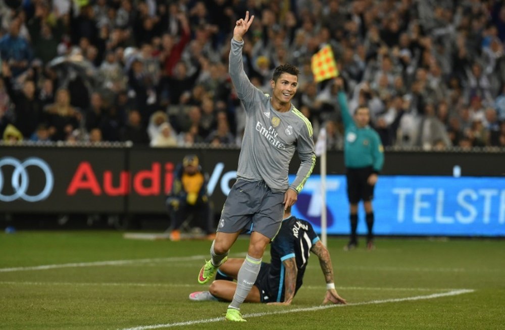 Real Madrid midfielder Cristiano Ronaldo reacts to the fans after scoring his team second goal during the International Champions Cup match against Manchester City in Melbourne on July 24, 2015