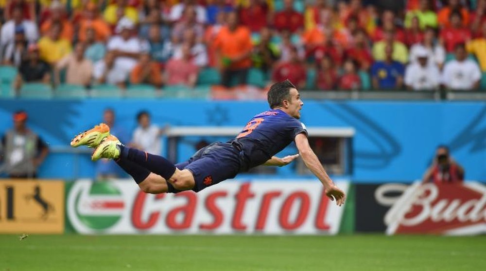 Robin van Persie scores for Netherlands in a World Cup match against Spain in Salvador on June 13, 2014