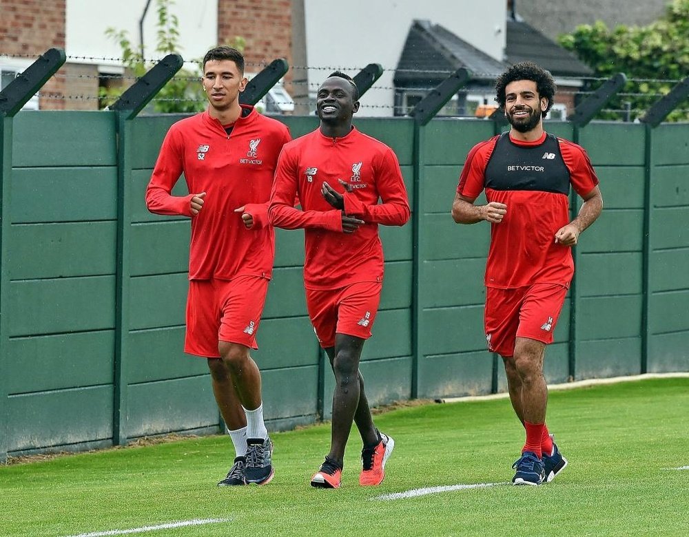 The pair returned to training on Friday. Twitter/LFC
