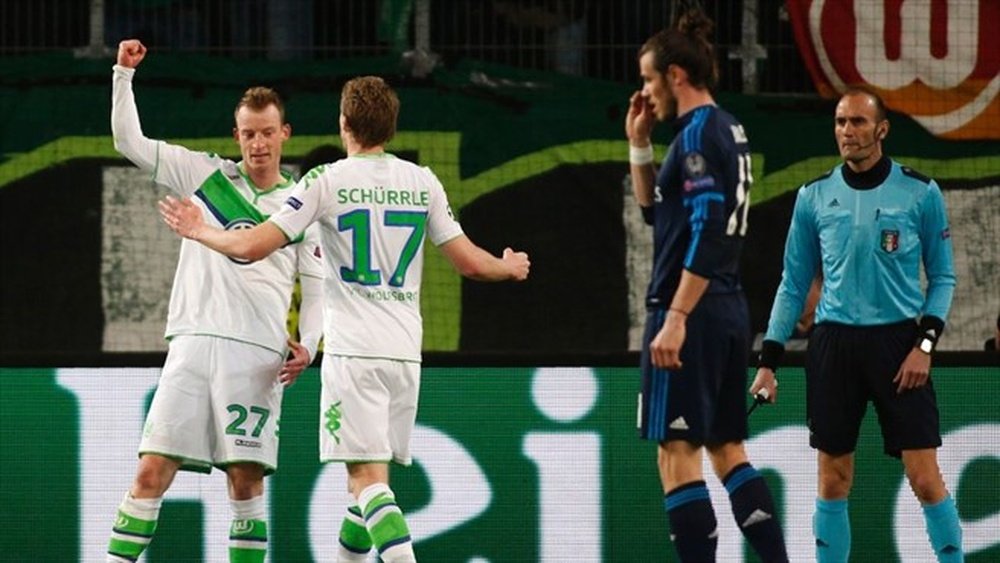 Schürrle y Arnold celebran el tanto del segundo en el Wolfsburgo-Real Madrid de cuartos de Champions. UEFA/AFP