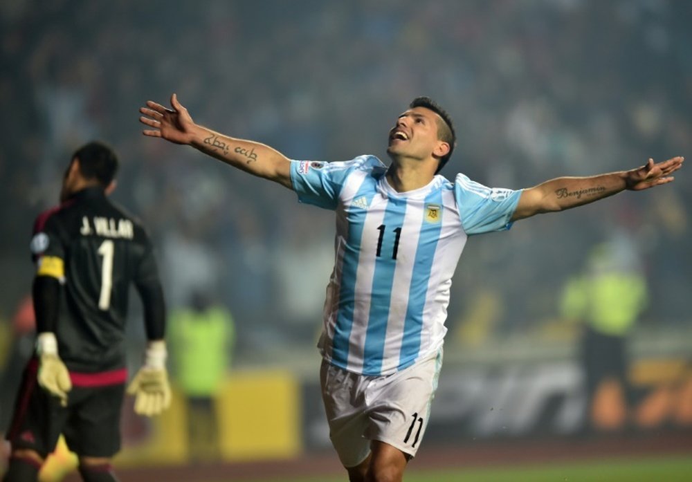 Sergio Aguero celebrates after scoring against Paraguay during their Copa America semifinal football match in Concepcion, Chile on June 30, 2015