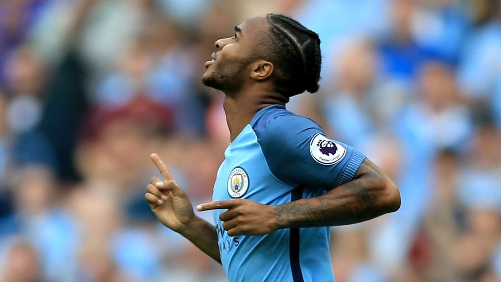 Sterling celebrates scoring his second and Man City's third goal. MCFC