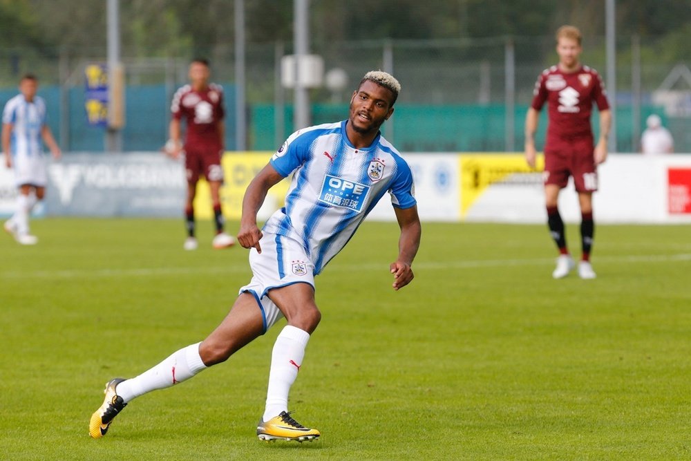 Huddersfield Town's record signing Steve Mounié has adapted quickly to the Premier League. AFP