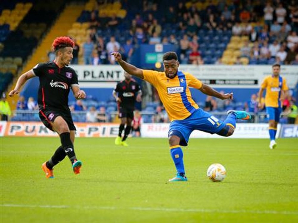 Striker Adi Yussuf (R) has been given a five-game ban. Mansfield FC