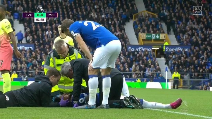 Walcott shaken up and on a stretcher after getting ball to the face