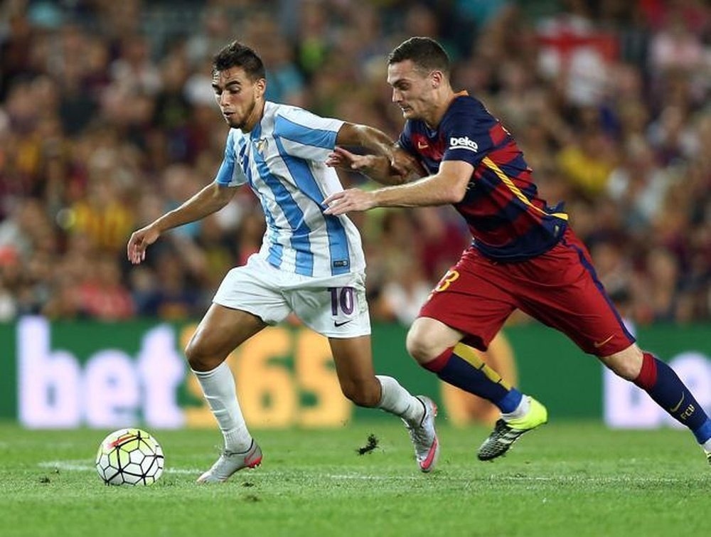 Thomas Vermaelen fighting for the ball against Ricardo Horta. Twitter