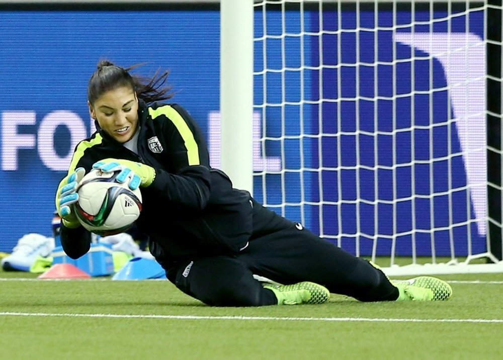 US goalkeeper Hope Solo stops a shot during training at Olympic Stadium on June 29, 2015 in Montreal, Canada