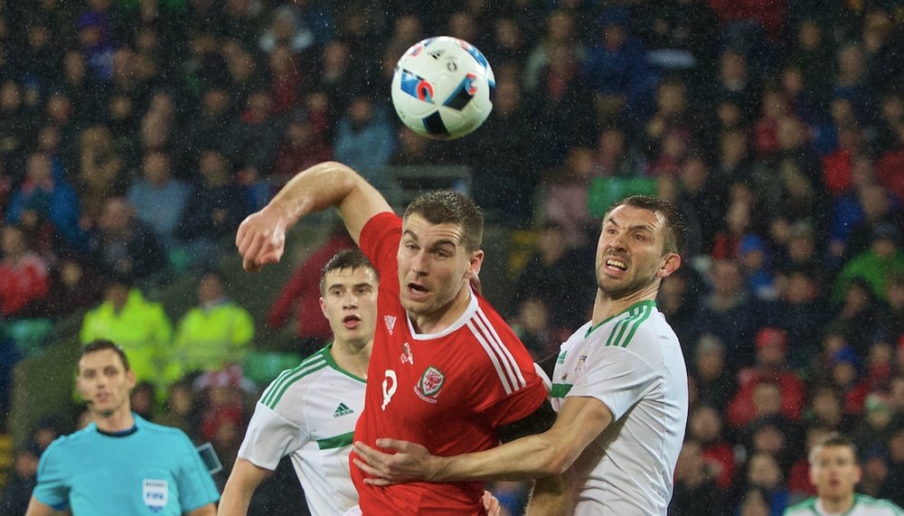 Vokes in action for Wales in a previous fixture against Northern Ireland. Twitter/FAW