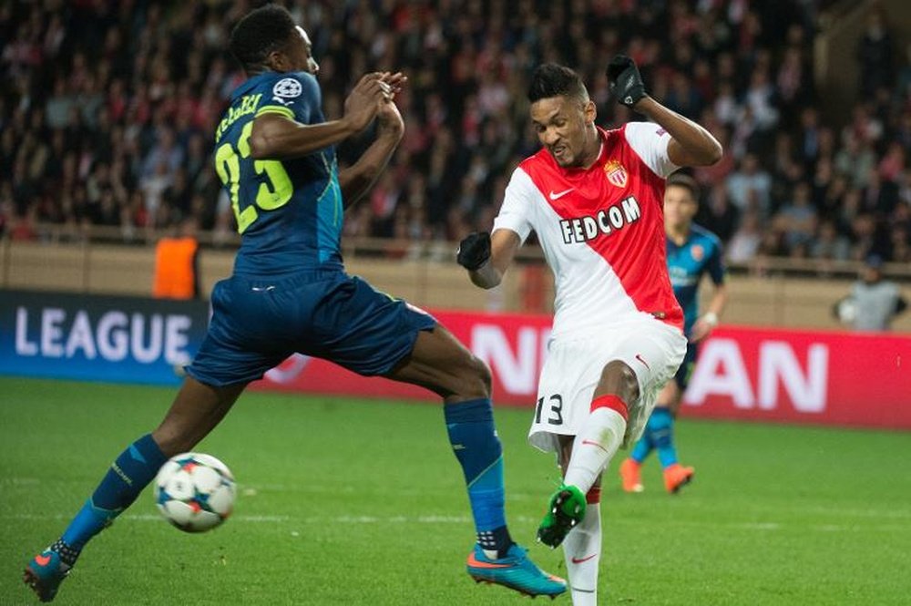 Wallace (right) kicks the ball in front of Danny Welbeck during the UEFA Champions League match at Louis II stadium in Monaco on March 17, 2015